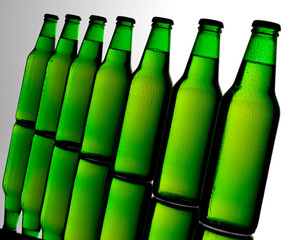 SEVEN GREEN BEER BOTTLES