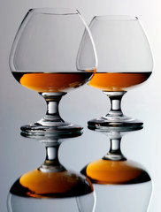 TWO GLASSES OF BRANDY