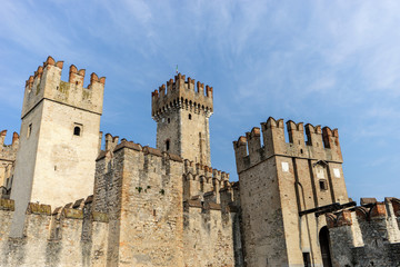 Fototapeta na wymiar Towers of the castle of Sirmione in Italy