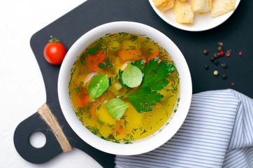 Vegetable Soup with Carrot, Bell Pepper, Potato, Leek and Herbs, Bowl of Healthy Vegetarian Soup