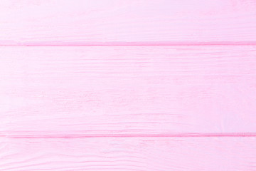 Pink wooden background. Wooden textured background. Copy space for text