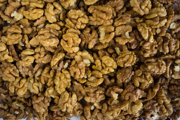 Walnuts background. Kernels walnuts. Top view. Vegetarian or healthy eating.