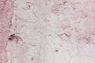 Old wall painted with pink paint as a background