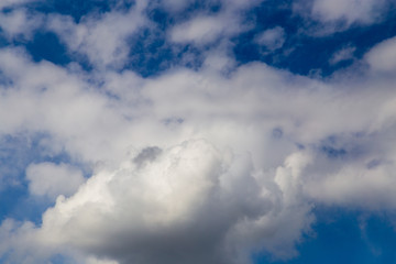 Clouds against blue sky as abstract background