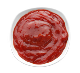Tasty tomato sauce in bowl on white background
