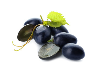 Ripe sweet grapes on white background