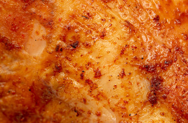 Obraz na płótnie Canvas Grilled fresh chicken crust as abstract background