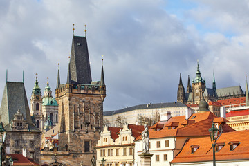 Fototapeta premium Houses with traditional red roofs in Prague, Czech Republic. View from above