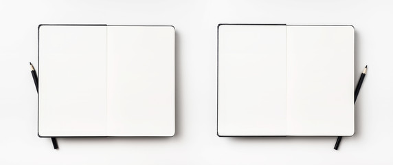 Top view of black notebook isolated on background