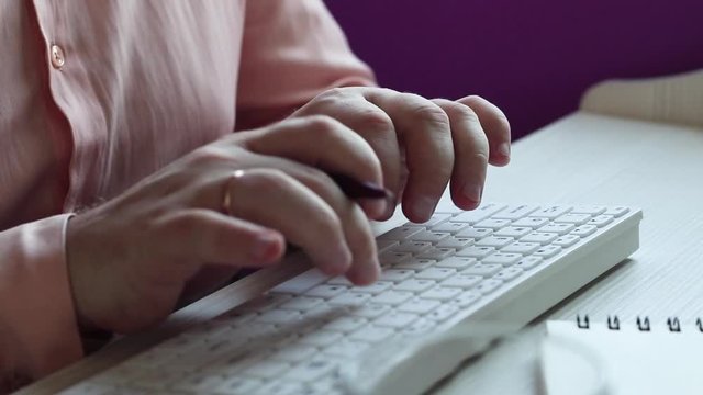 Close up of a man using computer / HD stock footage of person's hands typing on computer keyboard