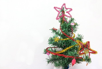 a small Christmas tree on the white background