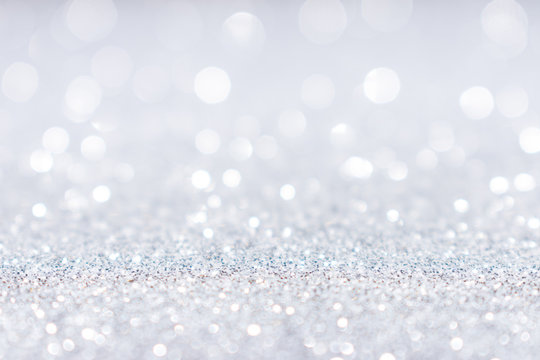 Abstract white silver glitter sparkle background.