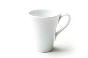 closeup of white porcelain cup of coffe on white background