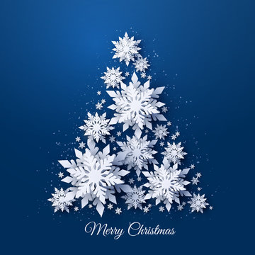 Vector Christmas and Happy New Year holidays greeting card with Christmas tree made of white realistic 3d paper cut layered snowflakes on dark blue background