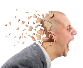 Screaming male head breaking into shards on white background