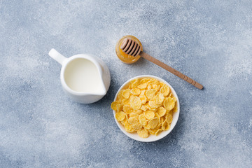 Fototapeta premium Healthy Breakfast of cereals, milk, honey and fruit. Balanced diet.