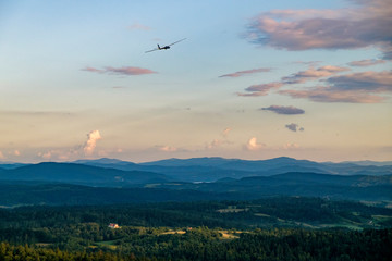Glider flying over mountains in Bezmiechowa Gorna, Poland. 29-07-2016