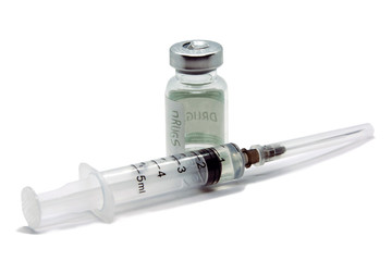 medical ampoule and syringe isolated on white background