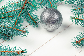 Christmas background, pine tree branches with decoration