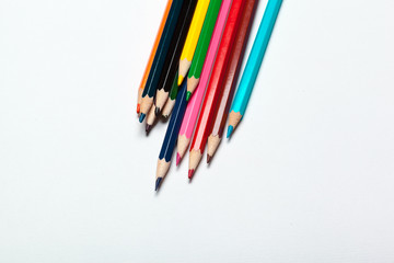 Wooden colorful ordinary pencils isolated on a white background