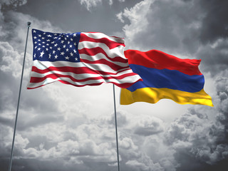 United States of America, USA & Armenia Flags are waving in the sky with dark clouds