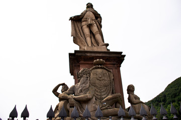 Statue of of Prince Karl Theodor and the accompanying deities on the Old Bridge in Heidelberg, Germany