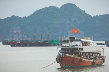 Floating fishing village and fishing boats in Cat Ba Island, Vietnam, Southeast Asia. UNESCO World Heritage Site. © Curioso.Photography