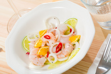 Ceviche with shrimps, lime, tangerine and hot pepper