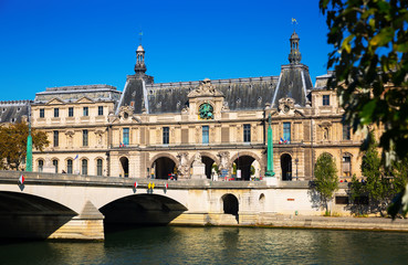 Fototapeta na wymiar Pont du Carrousel leading to Louvre palace