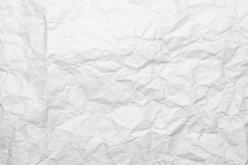 Texture of a crumpled white sheet of a paper.