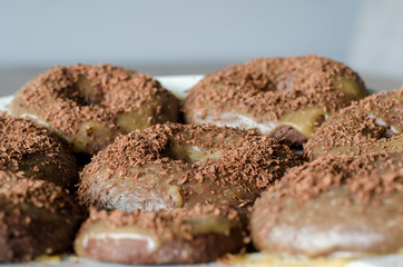 Maple-glazed Bronuts. Mixed brownie and donut. Close up