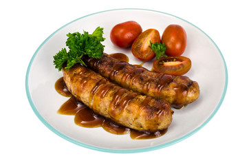 Grilled sausages with sauce