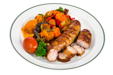 Grilled sausages with baked vegetables