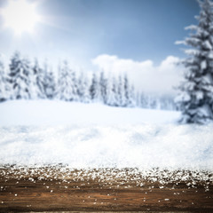 Table background with snow and frost 