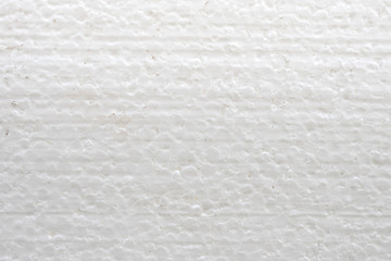 White Styrofoam Texture. White styrofoam balls background. Close shot. Safe packaging for fragile items. Detailed background of white styrofoam material
