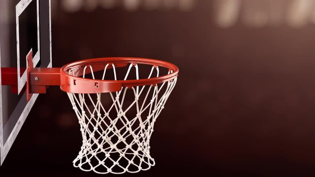 A beautiful throw basketball ball in a ring on the basketball court