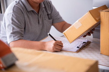 Shipping staff are checking the product before shipping to the customer.