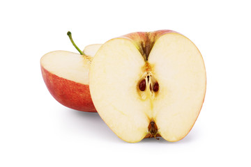 Two halves of a red apple on a white background