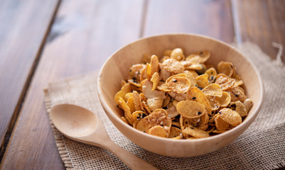 cornflake in wooden bowl for breakfast