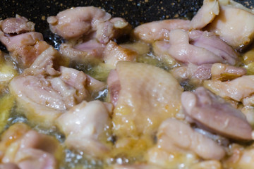 Chicken pieces boiling
