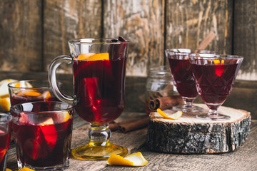 Christmas hot drinks with citrus fruits and spices, mulled wine