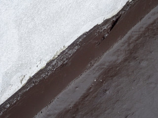 Waterproof coatings applied on flat roof concrete surfaces. There are several layers and layers of...