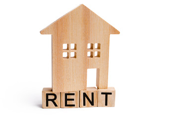 Wooden house with the inscription rent. Rental of property, apartments. services of a realtor....