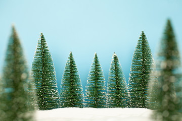 Landscape forest with christmas trees on the snow in winter. Christmas holiday celebration and new year concept. copy space