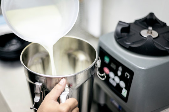 Making Gelato Ice Cream With Modern Equipment In Kitchen Interior