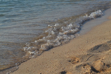 Sea waves on the sand