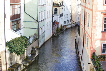 Fototapeta na wymiar View of old Prague with canals and houses. Vacation travel destination