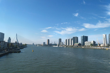 Fototapeta na wymiar view on river in Rotterdam with modern cityscape