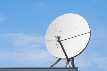 satellite dish close up, against the blue sky