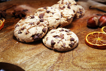 Chocolate cookies on wooden table. Chocolate chip cookies shot